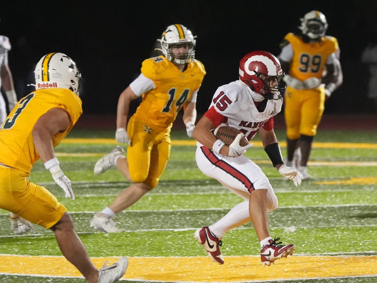 Manual’s Noah Price runs for a first down against St. X at Brother Thomas More Stadium Friday night. Oct. 9, 2026