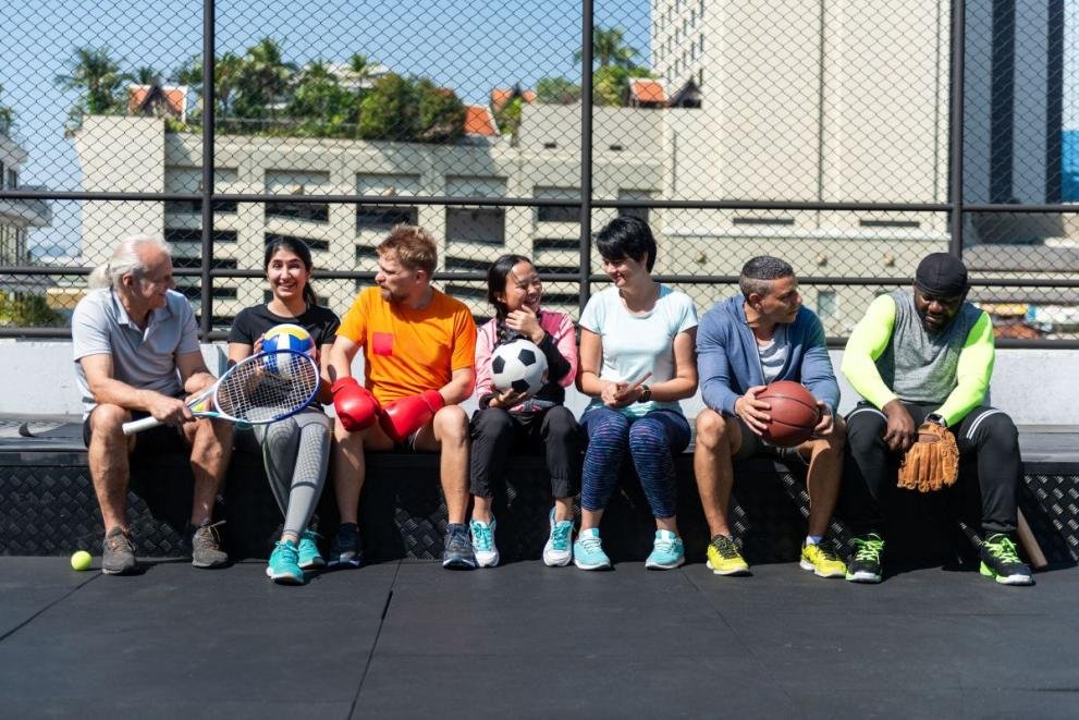 Diverse group enjoying sports outdoors