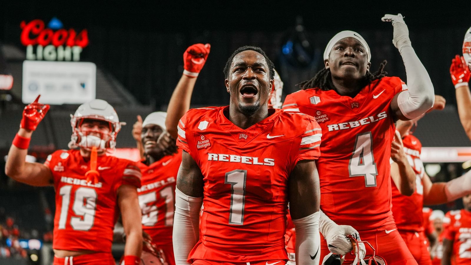 UNLV defensive back Mumu Bin-Wahad (1) and Tony-Louis Nkuba (4) celebrate with their team after defeating North Dakota State in college football game on Saturday October 10, 2026 at Allegiant Stadium in Las Vegas.