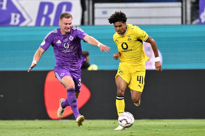 Mathis Albert of Borussia Dortmund runs with the ball during a DFB Cup match